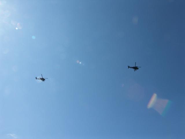 Some helicopters flew overhead.