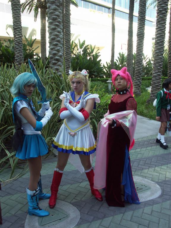 Left to right, Ami (Sailor Mercury), Usagi (Sailor Moon), Usagi (Dark Lady).