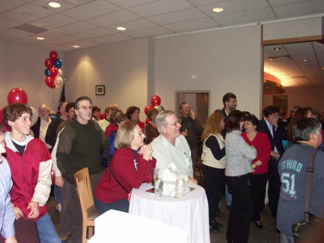 Victory Party listens to Weyhrauch's speech.